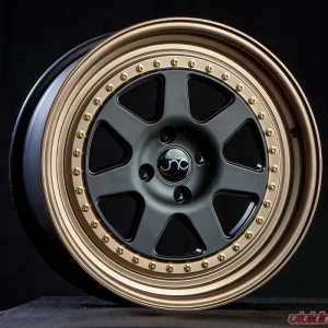 JNC JNC048 Wheel 17x8 4x100 25mm Matte Black w/ Bronze Lip - Image 1