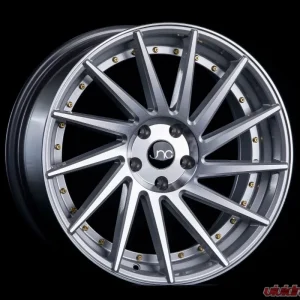 JNC JNC051 Wheel 18x9.5 5x100 35mm Silver w/ Machine Face & Gold Rivets - Image 1